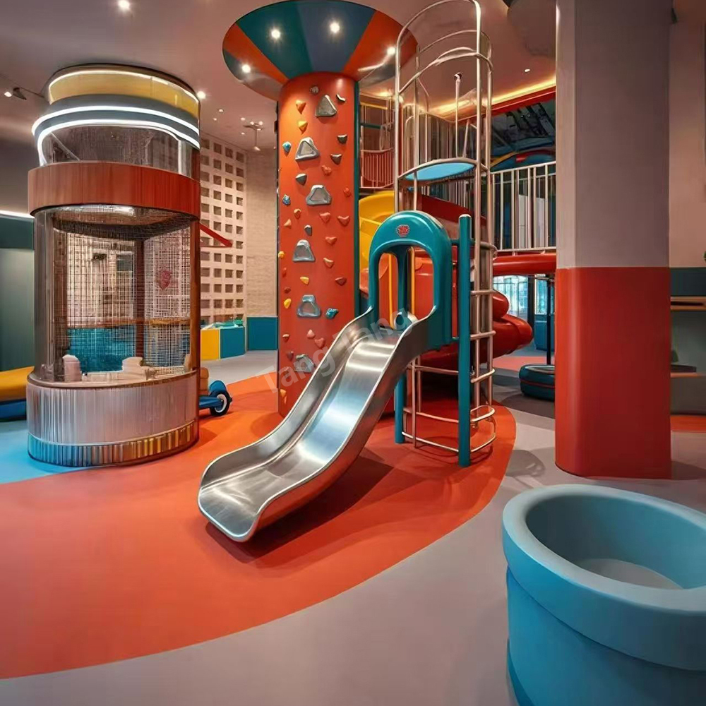 Commercial active play area with climbing wall and slide